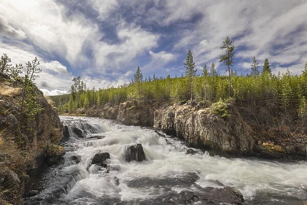 Cascading Firehole River and clouds, Yellowstone National Park, Wyoming