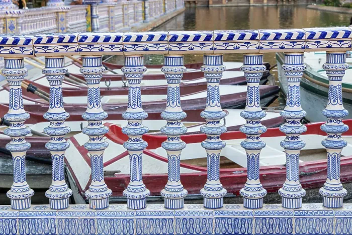 Framed Print : Casco Antiguo, Seville, Andalusia, Spain. Rowboats behind a ceramic banister at the canal in the Spanish Plaza of Seville Framed Print : Casco Antiguo, Seville, Andalusia, Spain. Rowboats behind a ceramic banister at the canal in the Spanish Plaza of Seville