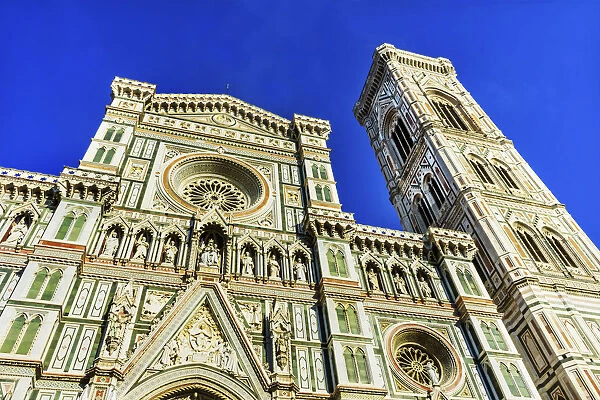 Cathedral di Santa Maria del Fiore facade, Florence, Italy. Baptistery was created in 1100 s