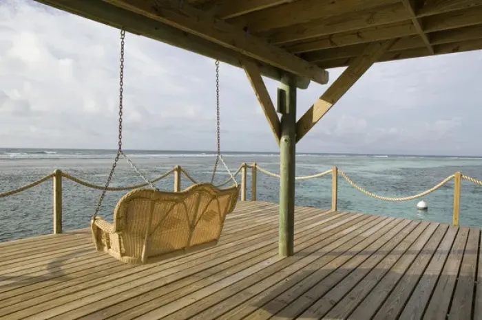 Framed Print : CAYMAN ISLANDS - CAYMAN BRAC - West End: Brac Reef Beach Resort  /  Beach Pier Swing