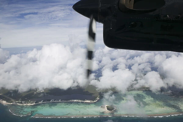 CAYMAN ISLANDS - LITTLE CAYMAN - Aerial: View of Little Cayman Island from Passenger