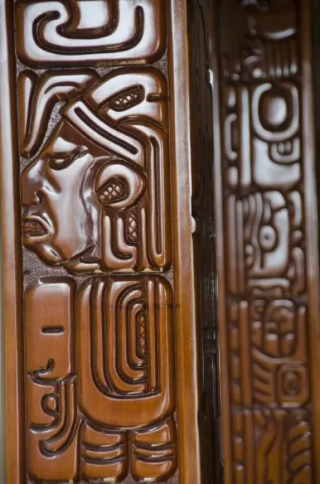 Framed Print : Central America, Belize. Belize City. Handcarved Mayan motif wooden building detail Framed Print : Central America, Belize. Belize City. Handcarved Mayan motif wooden building detail
