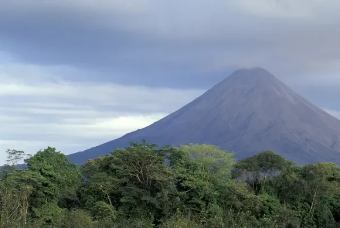 Framed Print : Central America, Costa Rica, Arenal Volcano. Rainforest beneath Arenal (erupting