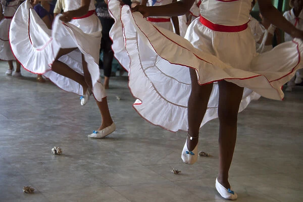 Central America, Cuba, Santa Clara. Cuban Dancers in Skirts
