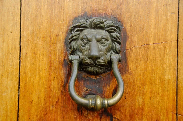 Central America, Guatemala, Antigua. UNESCO World Heritage Site. Lion door knocker