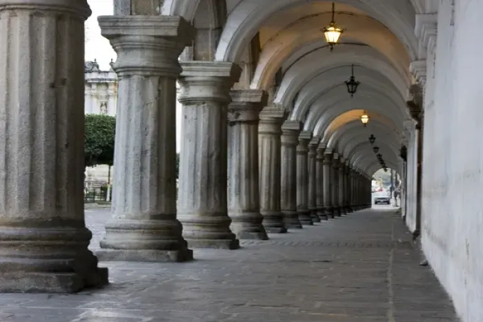 Framed Print : Central America, Guatemala, Antigua. Columns in front of the El Palacio de los Capitanes