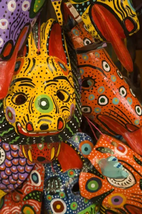 Framed Print : Central America, Guatemala, Antigua. Painted masks for sale in handicraft market