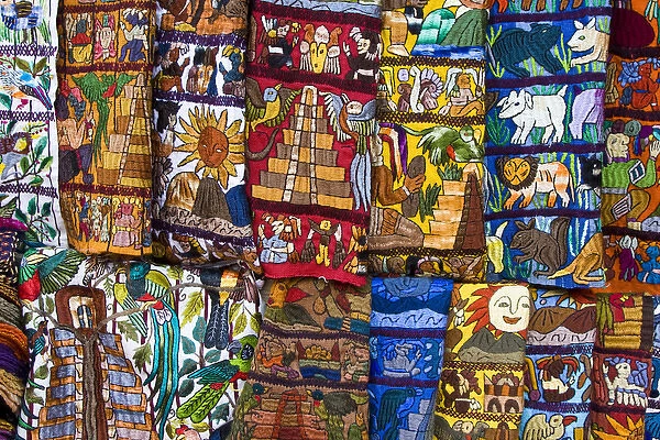Central America, Guatemala, Chichicastenango. Embroidered textiles for sale in Chichicastenango