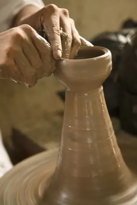 Framed Print : Central America, Nicaragua, Catarina. Potters hands creating clay pottery on spinning wheel