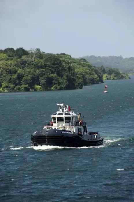 Framed Print : Central America, Panama, Panama Canal. Tug boat that helps ships transit the Panama Canal