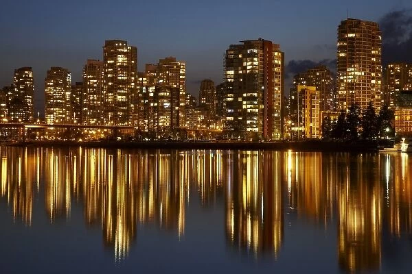 Central Business District reflected in False Creek, Vancouver, British Columbia, Canada