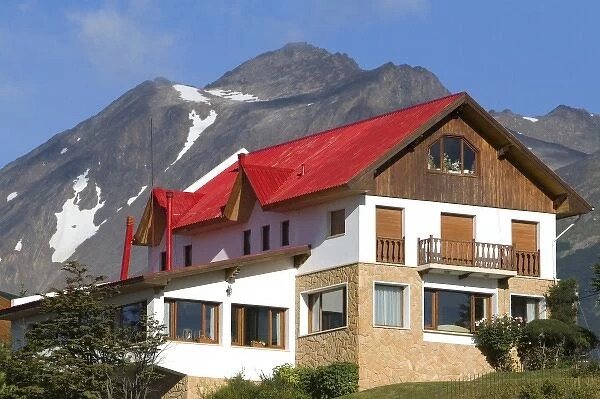 Chalet style house below the Martial mountain range at Ushuaia, Tierra del Fuego, Argentina