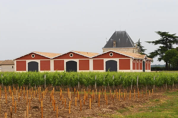 Chateau l Evangile with its distinctive red winery building Pomerol Bordeaux