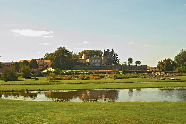 Chateau Lafite Rothschild in Pauillac, Medoc, Bordeaux, with park garden and pond