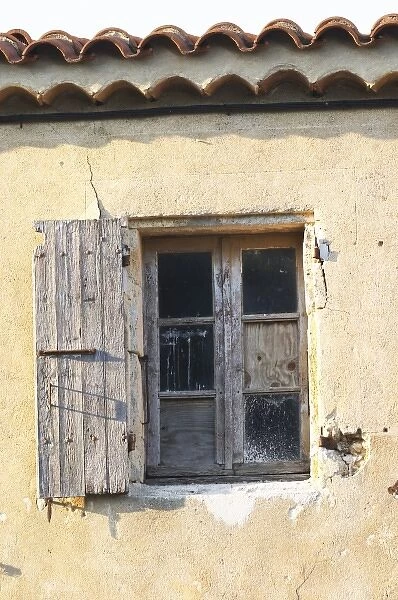 Chateau Mire l Etang. An old window with wooden shutter. La Clape. Languedoc