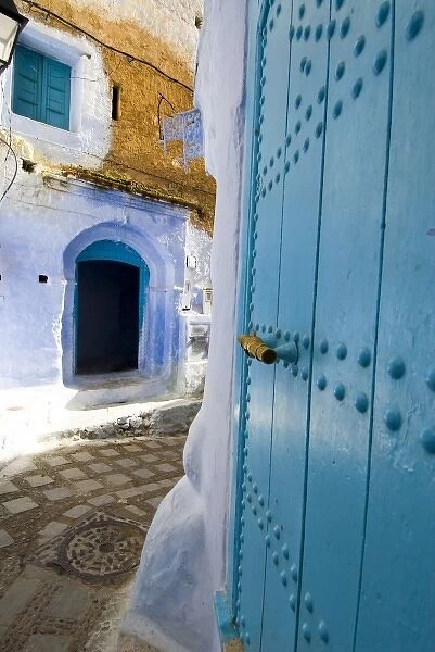 Chefchaouen Morocco narrow street with blue doors in the medina