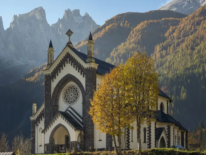 Framed Print : Chiesa di San Sebastiano in Falcade in Val Biois, in the background the Focobon mountain Framed Print : Chiesa di San Sebastiano in Falcade in Val Biois, in the background the Focobon mountain