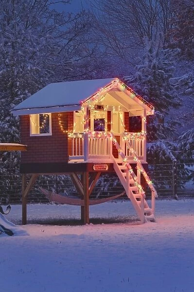 Childs playhouse in winter with snow and Christmas lights, Louisville, Kentucky