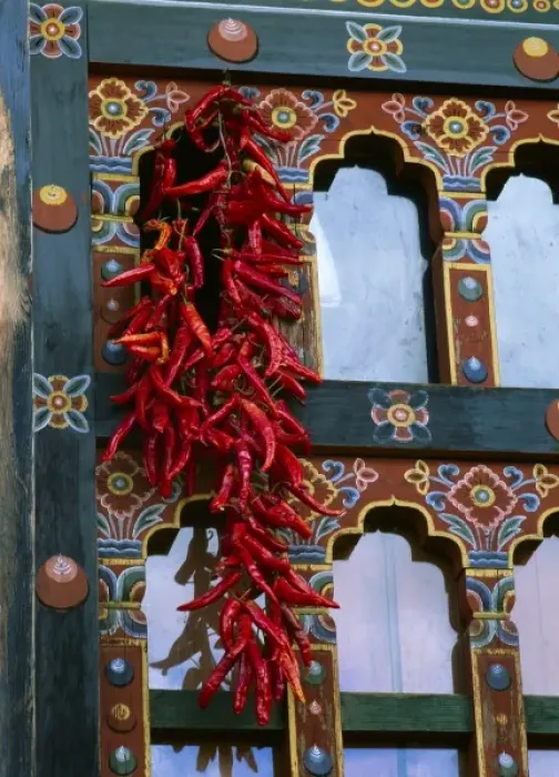 Framed Print : Chili peppers adorn many houses in Bhutan and are used in cooking many dishes