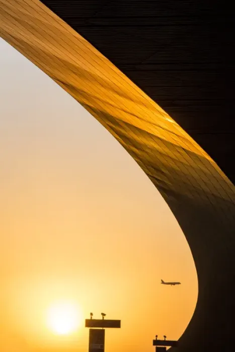 Framed Print : China, Beijing, Setting sun lights curved exterior roof line at Beijing International Airport Framed Print : China, Beijing, Setting sun lights curved exterior roof line at Beijing International Airport