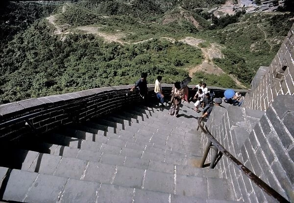 China, Hebei Province, Badaling, The Great Wall. Visitors make their way up the steep