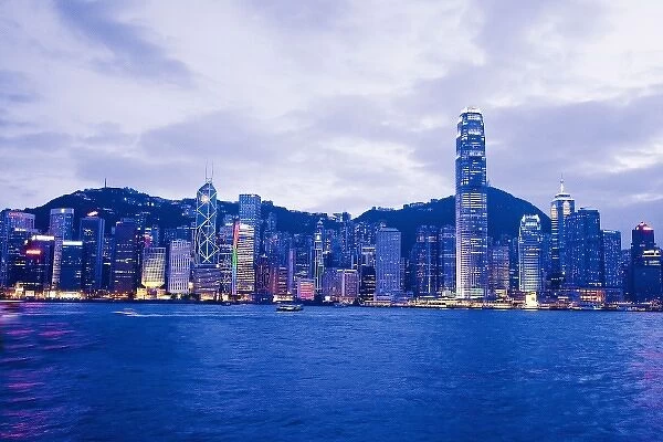 China, Hong Kong, Early evening view of the city as seen by boat from Hong Kong Harbor