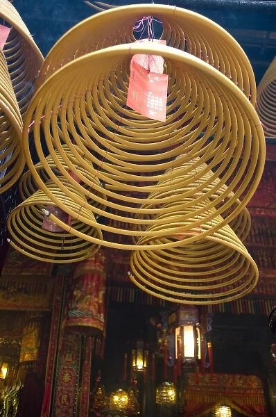 China, Hong Kong, New Territories, Tai Po area. Man Mo Temple. Large coils of burning