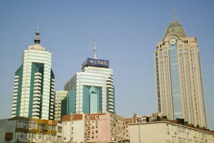 Framed Print : China, Shandong Province, Qingdao. Qingdao Old Town- Old town skyscrapers on Qingdao Bay