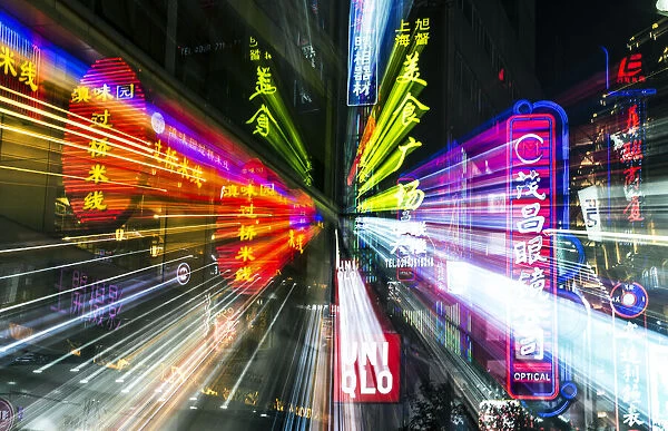 China, Shanghai. Nanjing Road neon sign blur