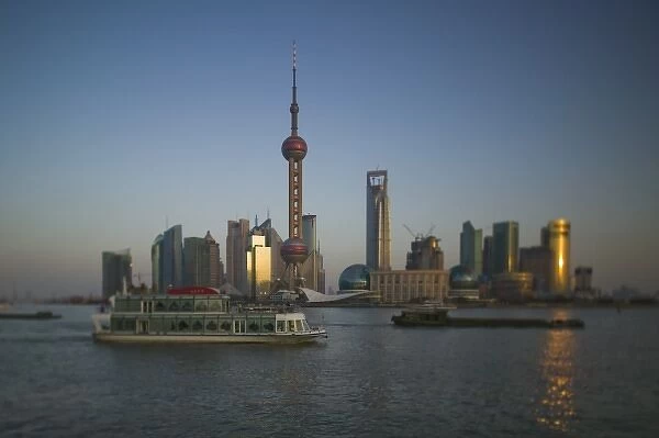 CHINA, Shanghai. Pudong District-Buildings of Pudong from the Huangpu River  /  Defocussed  /  Dusk