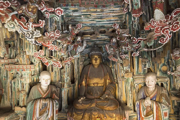 China, Shanxi Province, Ancient Buddha sculpture inside Hanging Palace (Xuankong