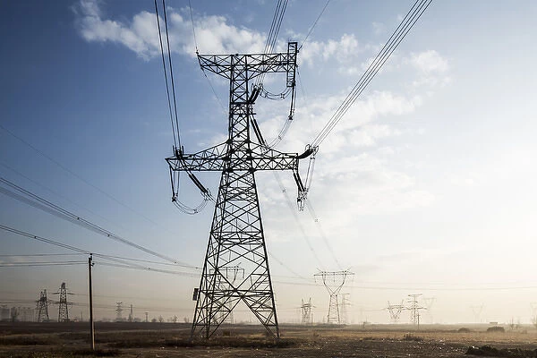 China, Shanxi Province, Datong, High Tension Power Pylons and electrical lines leading
