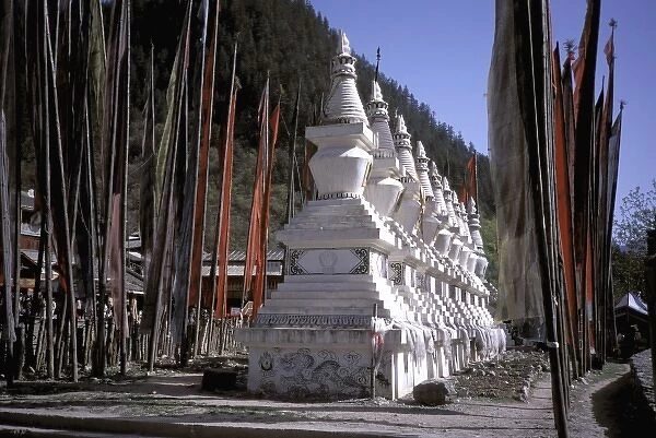 China, Sichuan Province. Row of stupas at Tibetan shuzheng stockade-Jiuhaigou