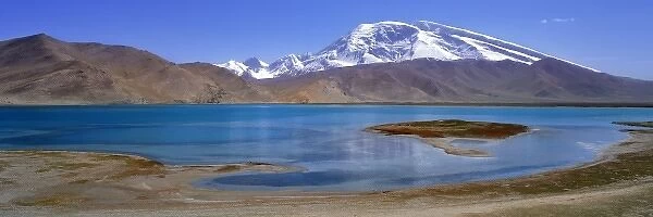 China, Xinjiang, Kalakuli Lake. Kalakuli Lake reflects snow-covered Mustagata Peak