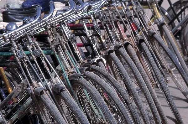 China, Xinjiang, Kashgar. Bicycles are parked in a sardine-like manner in Kashgar, Xinjiang, China