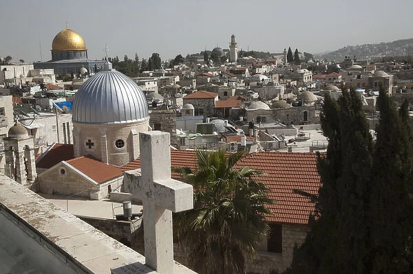 Christian rooftop cross and silver church dome and Golden Muslim Dome of the Rock