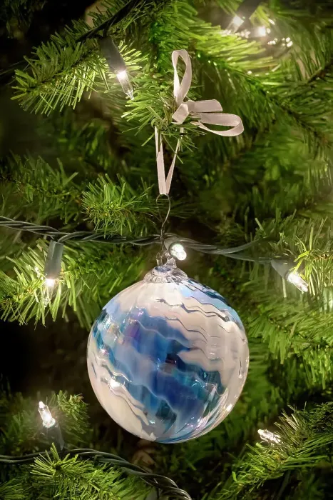 Framed Print : Christmas ornament and lights on an artificial tree Framed Print : Christmas ornament and lights on an artificial tree