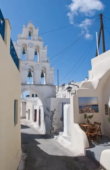 Framed Print : Church with bells in small traditional village near Kamari in Santorini in Greek Islands Framed Print : Church with bells in small traditional village near Kamari in Santorini in Greek Islands