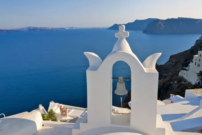 Framed Print : Church on the coast of Aegean Sea. Oia, Santorini Island, Greece