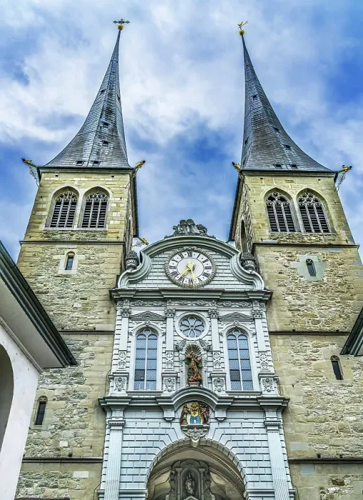 Framed Print : Church of St. Leodegar Facade, Lucerne, Switzerland. St. Michael statue Originally a monastery in 1100's became a church in 1874