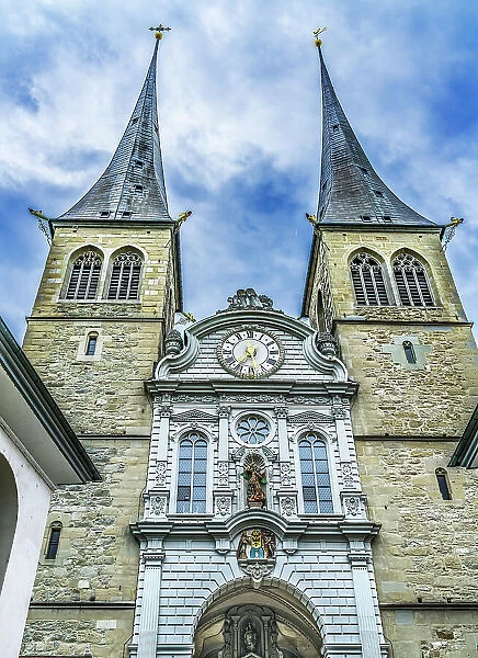 Church of St. Leodegar Facade, Lucerne, Switzerland. St. Michael statue Originally a monastery in 1100's became a church in 1874
