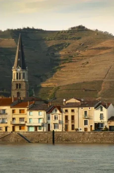 Framed Print : The church in Tain and houses along the river. The Hermitage vineyards on the hill Framed Print : The church in Tain and houses along the river. The Hermitage vineyards on the hill