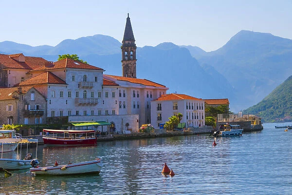 Church tower and houses on the Adriatic coast, Perast, Montenegro