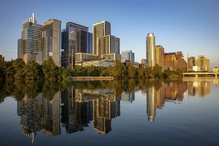 Framed Print : City skyline reflects in the Colorado River in Austin, Texas, USA Framed Print : City skyline reflects in the Colorado River in Austin, Texas, USA