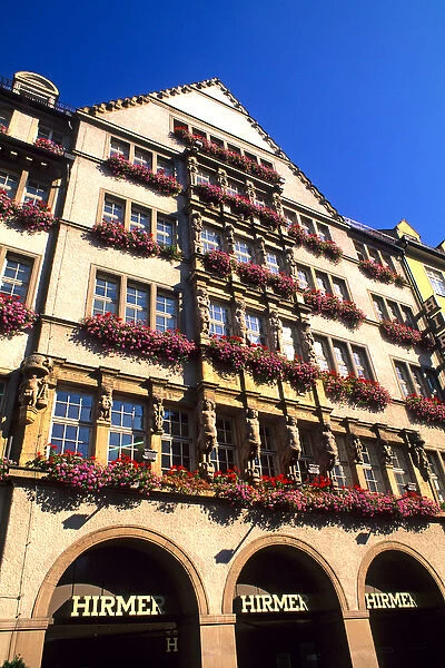 Classic Arcitechture with Flower Filled Window Boxes in Munich Germany