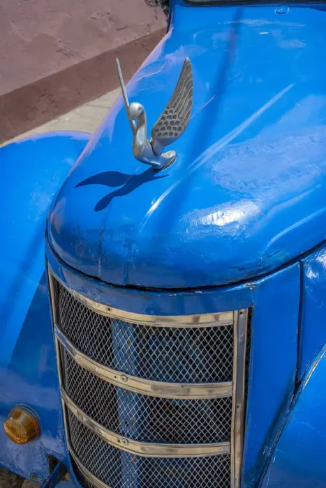 Framed Print : Detail of classic blue American car with chrome swan hood ornament in Trinidad, Cuba Framed Print : Detail of classic blue American car with chrome swan hood ornament in Trinidad, Cuba