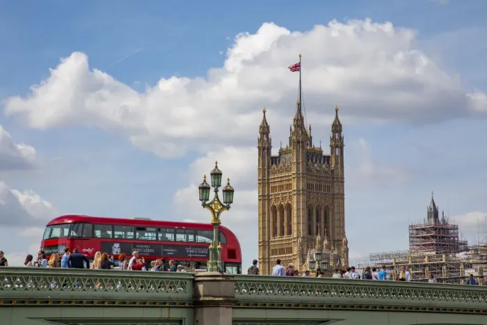 Framed Print : Classic double decker tour bus in London, England crossing the bridge River Thames with