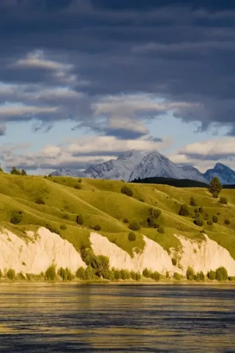 Framed Print : Clay Cliffs reflect into the Flathead River with Mission mountains in the background Framed Print : Clay Cliffs reflect into the Flathead River with Mission mountains in the background
