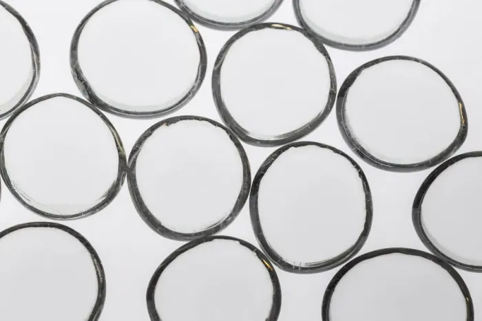 Framed Print : Clear Glass Pebbles with light