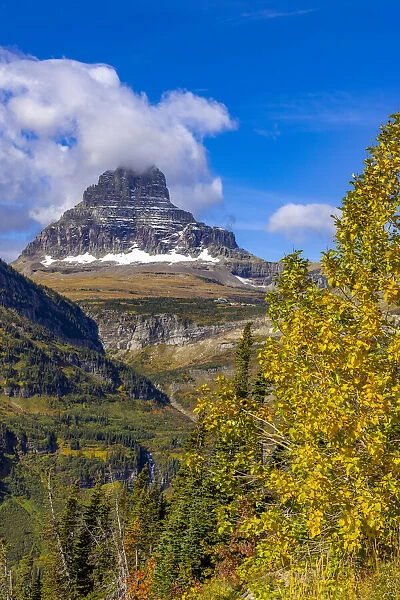 Clements Mountain and Reynolds Creek Falls in autumn, Glacier National Park, Montana, USA